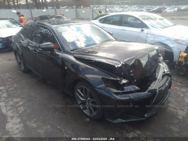 The car sitting in the auction yard